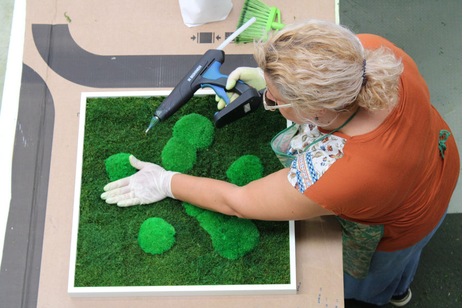 Pole moss picture being made in the mossence studio near Porto, seen from above